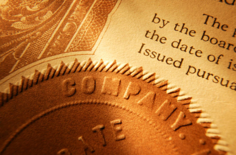 Close up of a company seal on old stock certificate